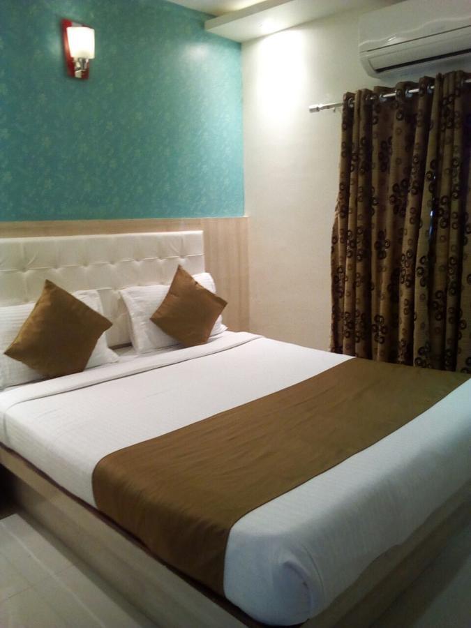 Hotel Grace Inn Мумбаи Экстерьер фото
