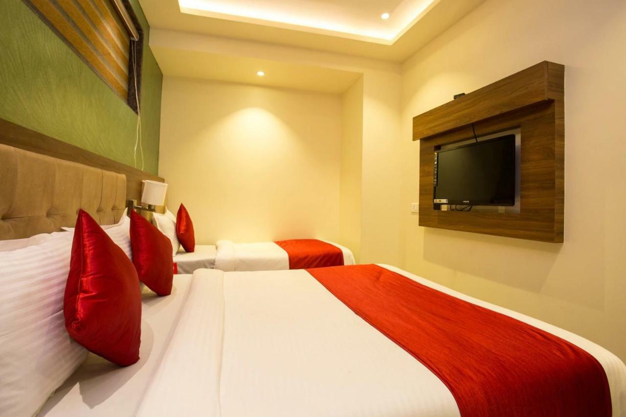 Hotel Grace Inn Мумбаи Экстерьер фото